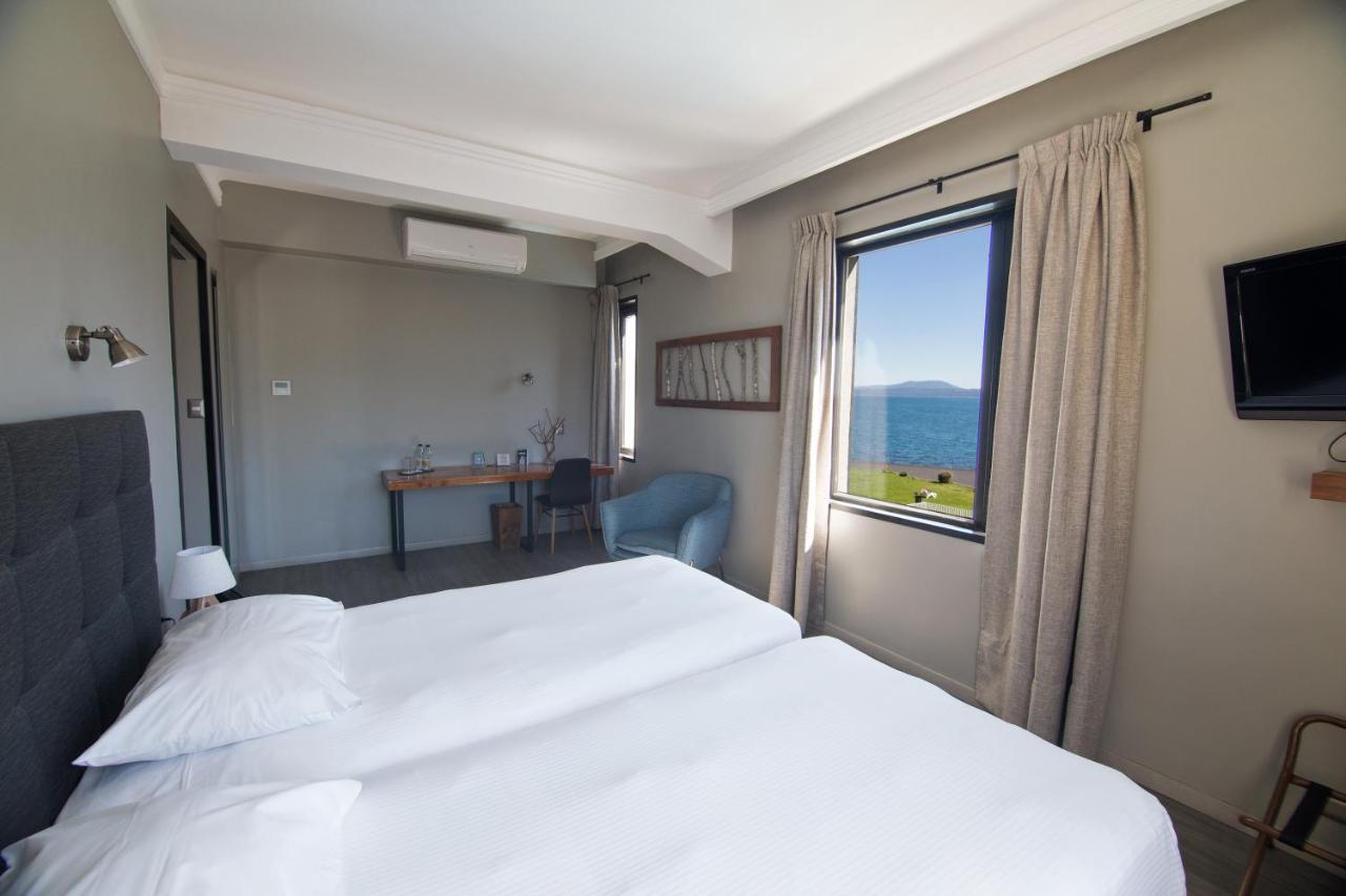 Hotel Enjoy Пукон Экстерьер фото A room at the hotel