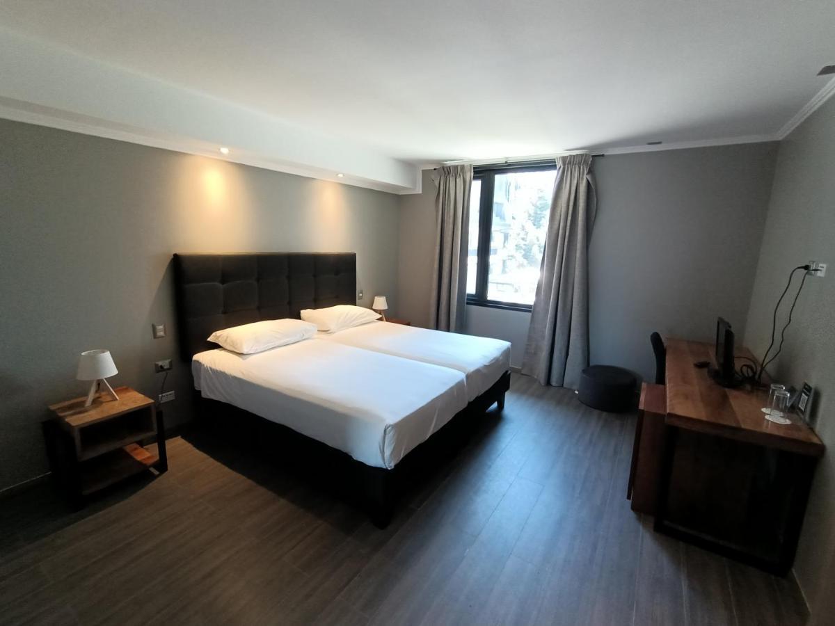 Hotel Enjoy Пукон Экстерьер фото A room at the hotel