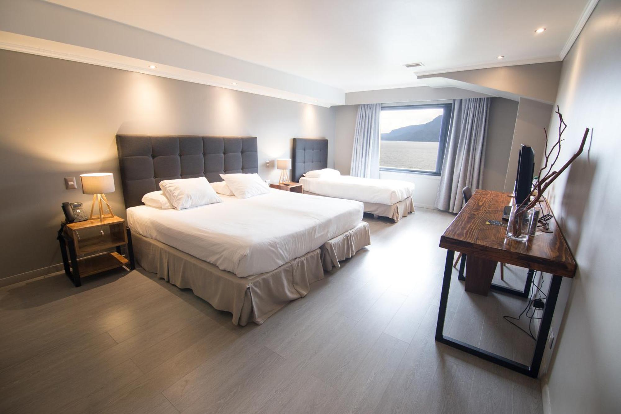 Hotel Enjoy Пукон Экстерьер фото A room at the hotel